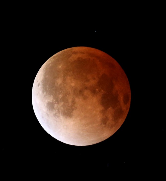 The moon is seen during a total lunar eclipse on April 15, 2014 in Miami, Florida