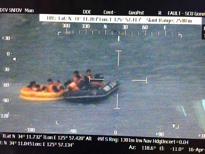 In this handout image provided by the Republic of Korea Coast Guard, passengers are rescued by the Republic of Korea Coast Guard from a ferry sinking off the coast of Jindo Island