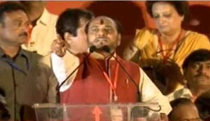 TV grab showing Ramdas Kadam addressing supporters in Modi's presence at Mumbai's MMRDA Grounds