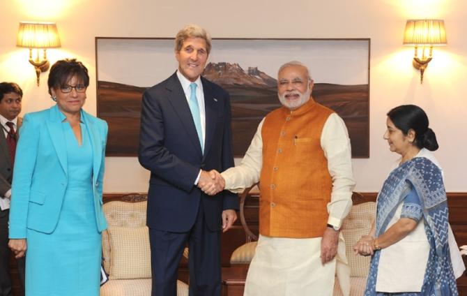 US Secretary of State John Kerry and US Secretary of Commerce Penny Pritzker calling on Prime Minister Narendra Modi, in New Delhi on August 01, 2014. The Union Minister for External Affairs and Overseas Indian Affairs Sushma Swaraj is also seen.