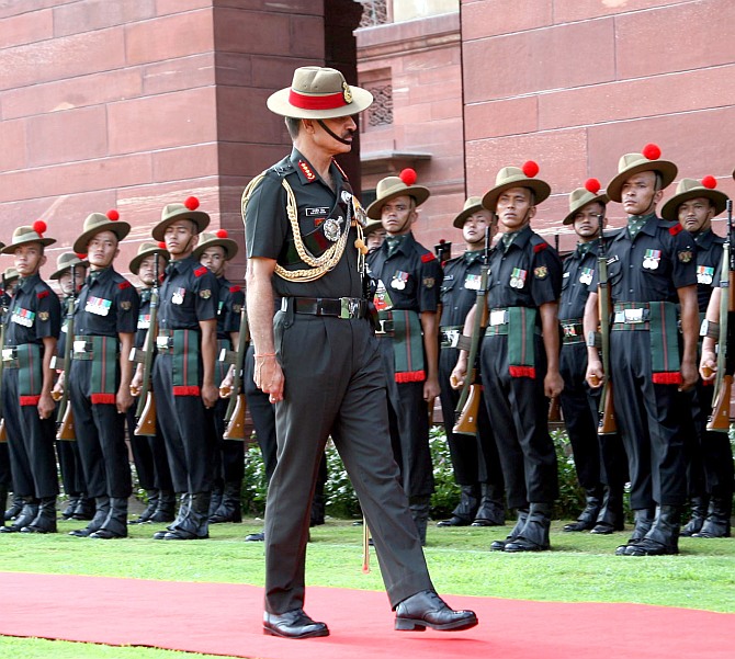 General Dalbir Singh Suhag inspects the guard of honour