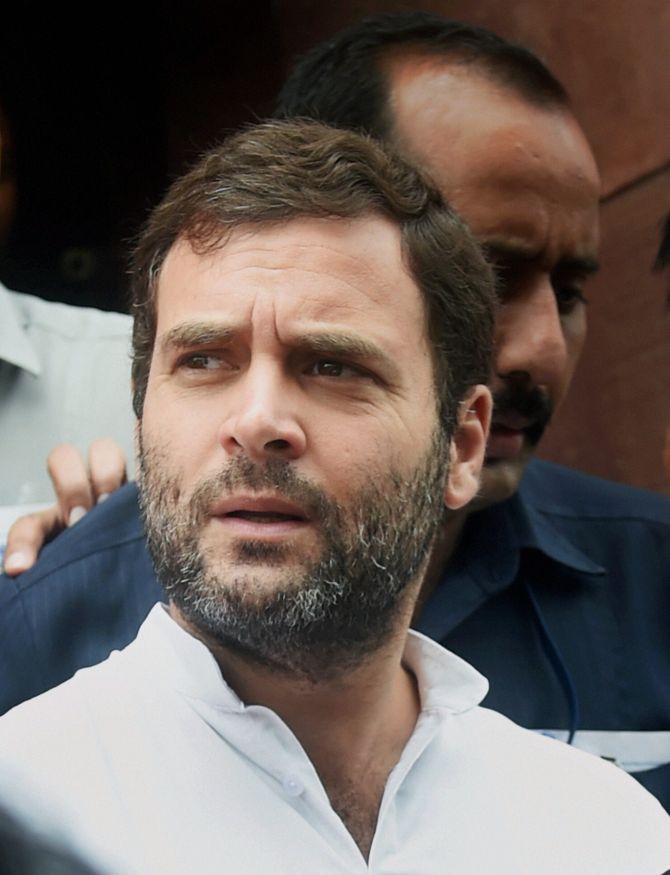 Rahul speaks to reporters outside Parliament. He accused the Speaker of being partial.