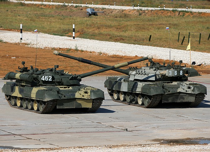 Russian T-72 tanks perform a drill during the World Tank Biathlon near Moscow