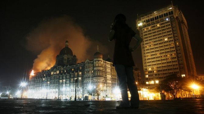 Smoke emerges from the Taj Mahal Hotel in Mumbai, in this photograph shot in the early hours of November 27, 2008.