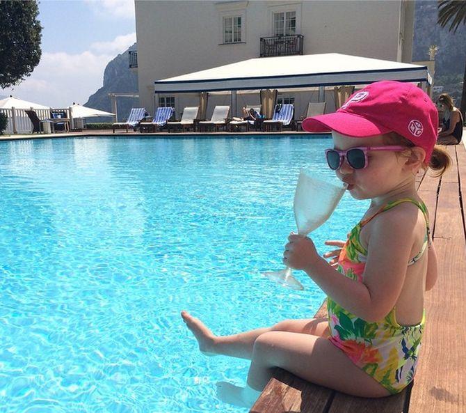 Curtis pictured sipping poolside in Capri, Italy.