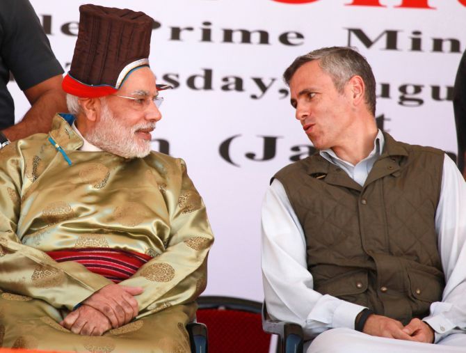Prime Minister Narendra Modi with then Jammu and Kashmir chief minister Omar Abdullah. Photograph: Umar Ganie