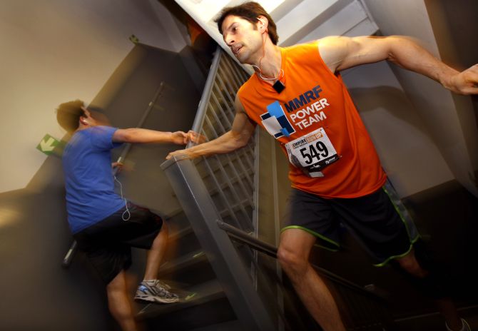 Competitors run up the stairwell on their way to the observation deck on the 86th floor of the Empire State Building in New York City during the 35th Empire State Building run-up race. 