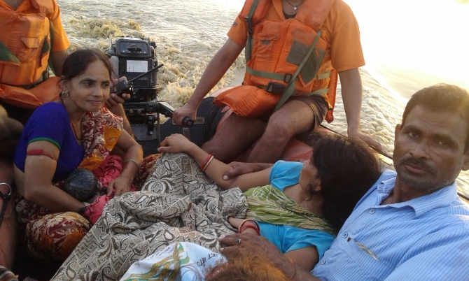 Pradeep and Manisha Shukla aboard the NDRF rescue boat