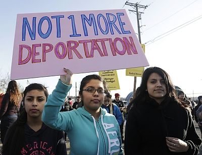 Immigrants rights supporters rally outside the US Immigration Customs Enforcement Northwest Detention Centre in Tacoma, Washington state, March 11, 2014. Dozens of detainees went on a hunger strike protesting deportations and detention centre conditions. Photograph: Jason Redmond/Reuters