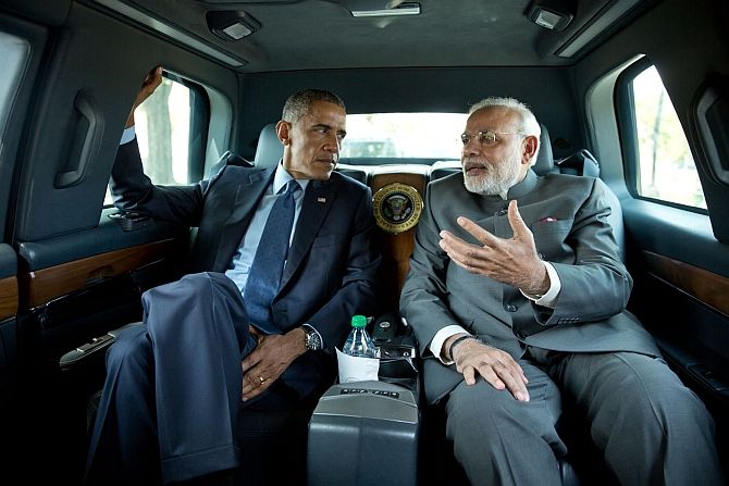 Narendra Modi travels with Barack Obama