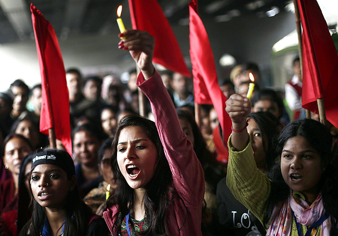 Protesters mark the first anniversary of the Delhi gang-rape, in New Delhi December 16, 2013.