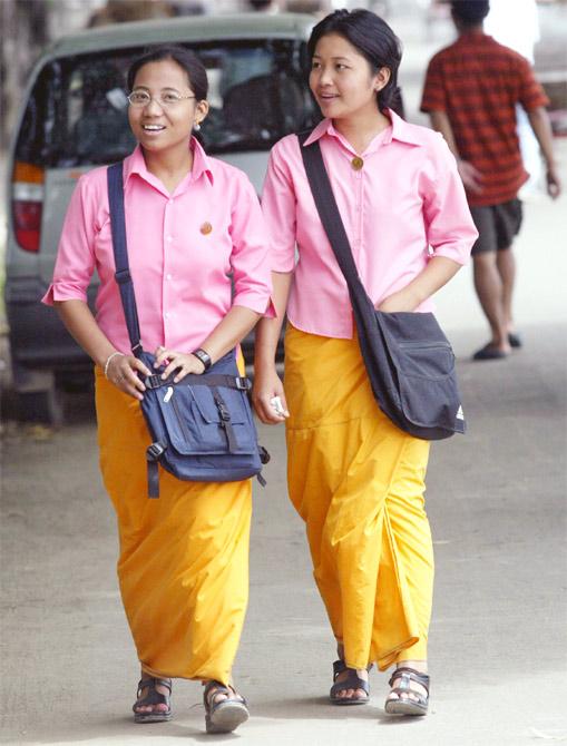 Girls walk down a street in Imphal, the capital of Manipur.