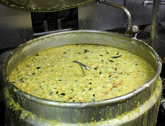 Khichdi being cooked in a vessel in IFRF's Tardeo kitchen
