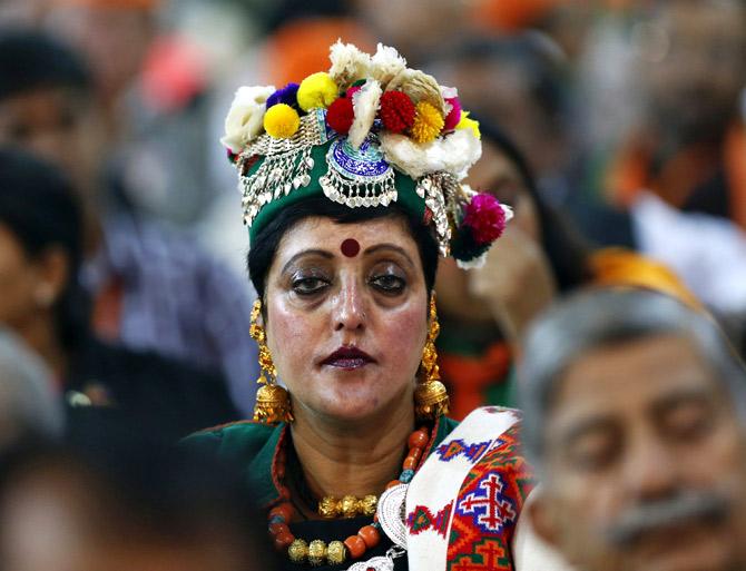 A supporter in traditional attire at a political rally at the Ramlila ground in New Delhi.