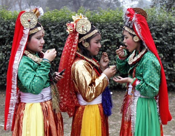 Folk dancers before the full dress rehearsal for the Republic Day parade in Kolkata.