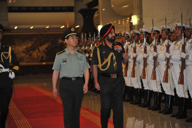 Army Chief General Bikram Singh inspects the Guard of Honour with Chinese Chief of General Staff of People's Liberation Army General Fang Fenghui