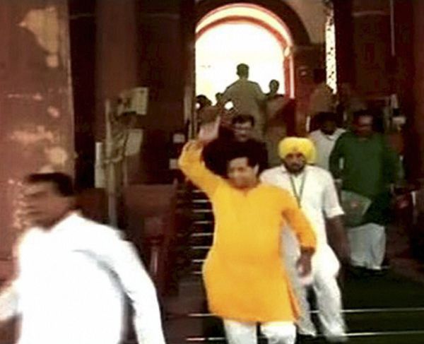 TMC and AAP members leave after a protest in the Lok Sabha.