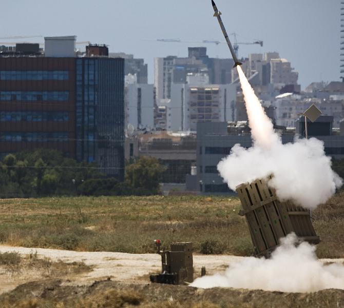 An Iron Dome launcher fires an interceptor rocket in the southern Israeli city of Ashdod July 11