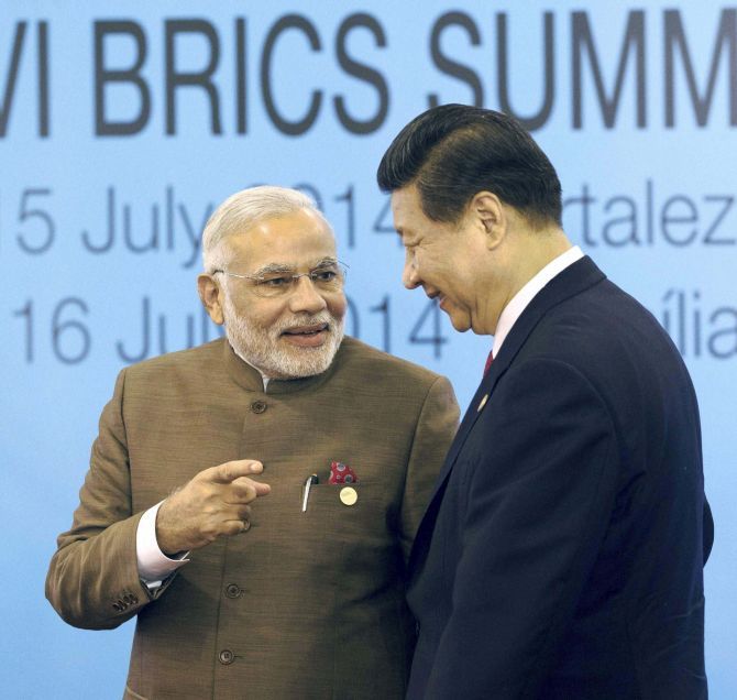 Prime Minister Narendra Modi with Chinese President Xi Jinping at the BRICS summit in July