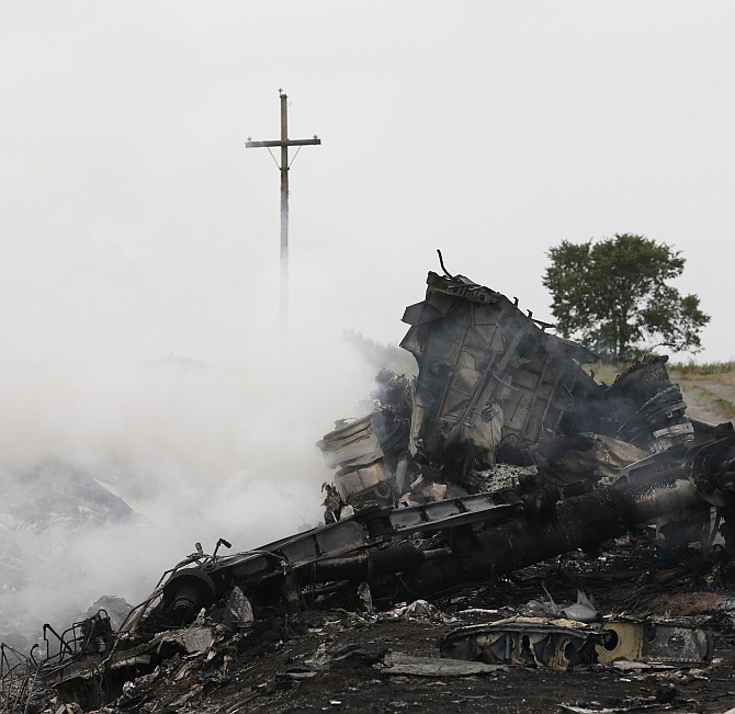 The site of the Malaysia Airlines Boeing 777 plane crash is seen near the settlement of Grabovo in the Donetsk region