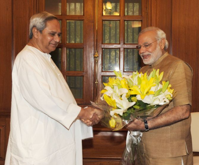 Odisha Chief Minister Naveen Patnaik greets Prime Minister Narendra Modi on June 2, 2014.