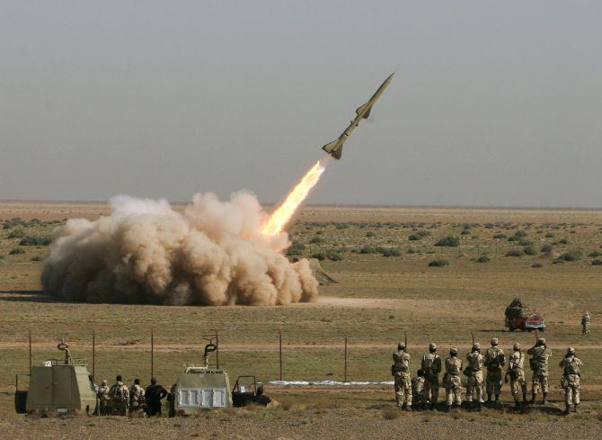 An Iranian Tondar missile is launched during a test at an unknown location in central Iran