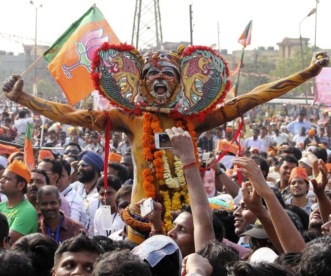 A supporter of BJP's PM hopeful Narenra Modi at his rally