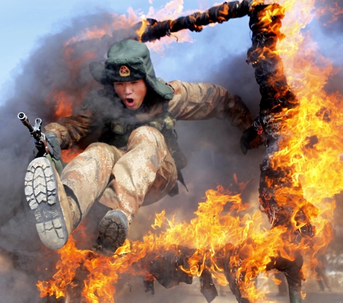 A frontier soldier from the People's Liberation Army undergoes training in Heihe, Heilongjiang province