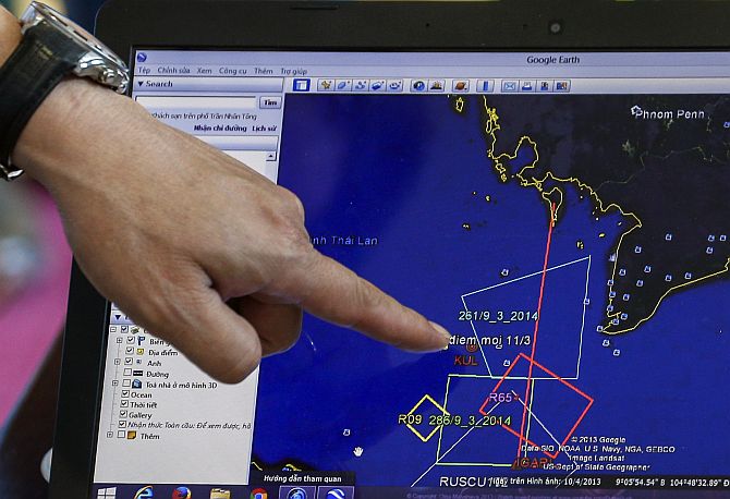 A map of a flight plan is seen on a computer screen during a meeting before a mission to find the Malaysia Airlines flight MH370 that disappeared from radar screens in the early hours of Saturday, at Phu Quoc Airport on Phu Quoc Island