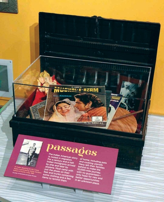 An immigrant's luggage is showcased at the exhibition.