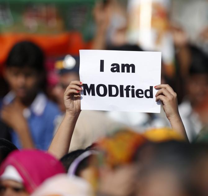 A supporter of Modi during a rally in Mumbai