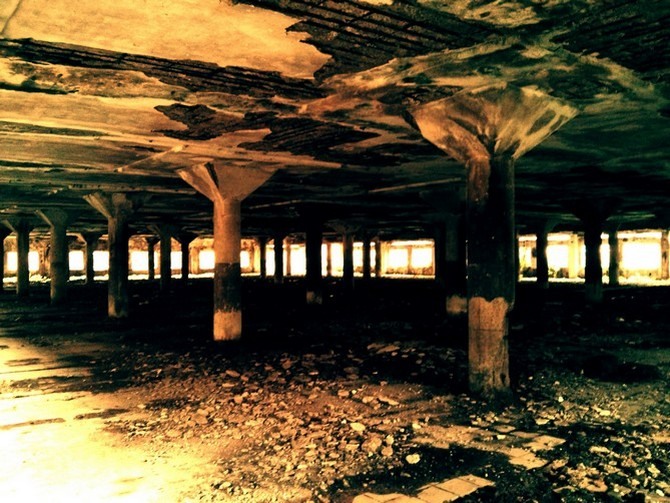 A sprawling pillared hall within the Shakti Mills compound that seems almost Chernobyl-esque