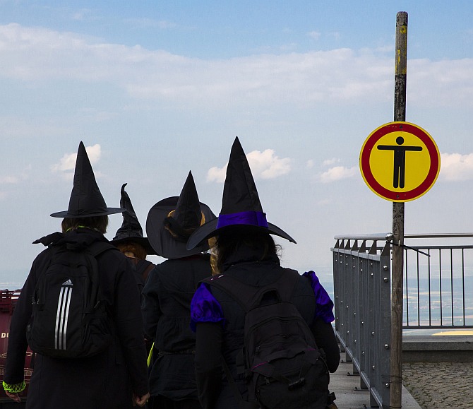 Women dressed up as a witches walk at the summit of Brocken mountain in the Harz region celebrating the Walpurgisnacht pagan festival