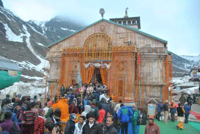 Devotees flock to the Kedarnath temple on the opening day of its reopening on Sunday