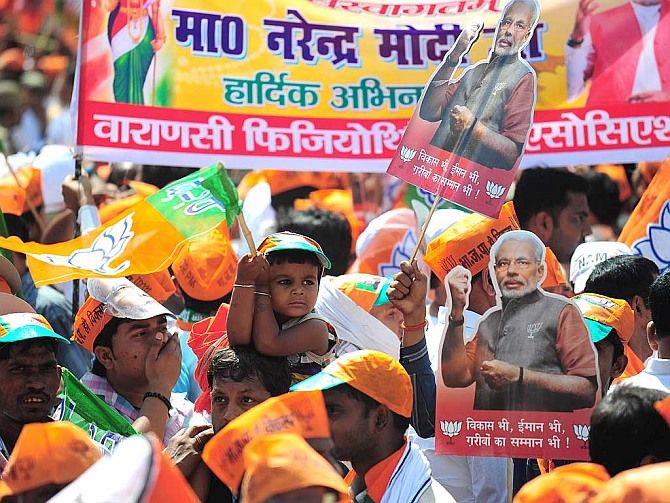 BJP supporters during the Modi road show in Varanasi. Photograph: PTI photo