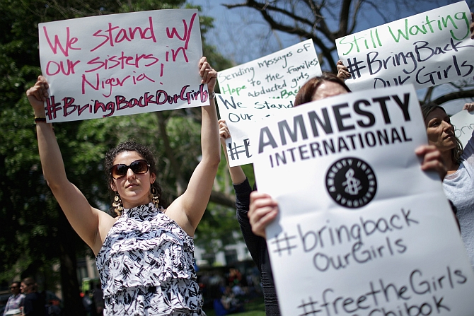 Amnesty International holds a vigil for the abducted girls in Washington DC