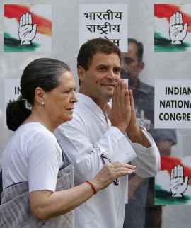 Congress President Sonia Gandhi with her son Rahul Gandhi after the party's debacle on May 16, 2014