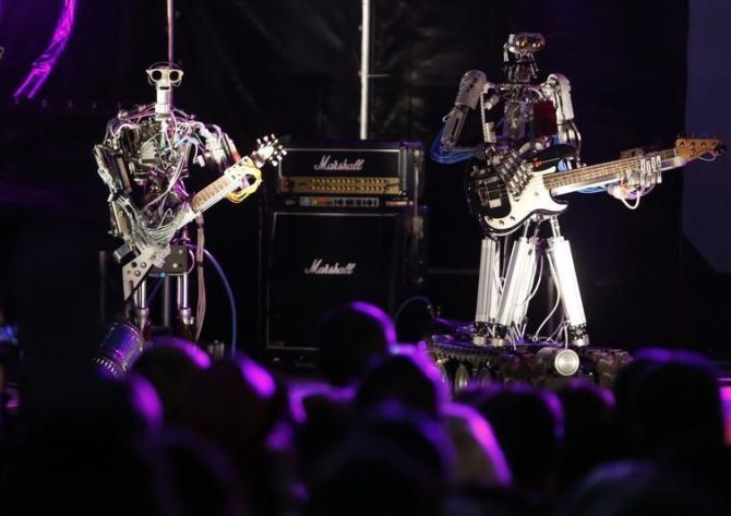 Robot musicians perform during the exhibition in Moscow.