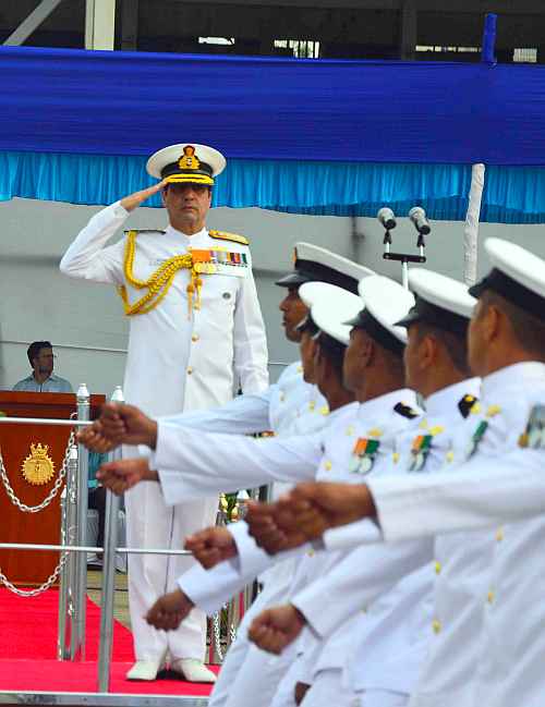 Chief of the Naval Staff Admiral R K Dhowan inspects a guard of honour at the Western Naval Command in Mumbai