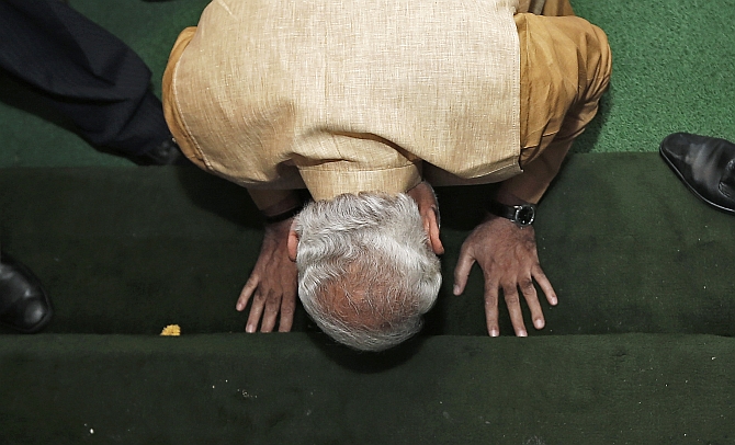 Narendra Modi pays obeisance to Parliament ahead of the BJP parliamentary meeting.