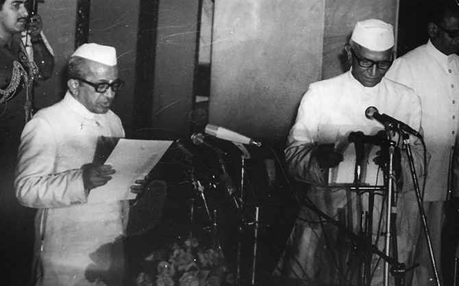 Morarji Desai, right, being sworn in as India's first non-Congress prime minister on March 24, 1977 by then acting President B D Jatti.