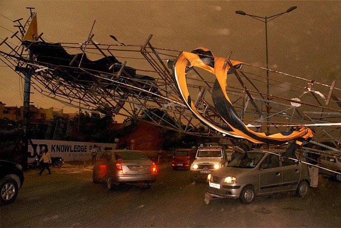 A damaged hoarding after the heavy storm