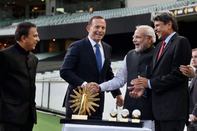 Prime Minister Narendra Modi with Sunil Gavaskar, Australian Prime  Minister Tony Abbott and Kapil Dev at the Melbourne Cricket ground. Photograph: PTI photo