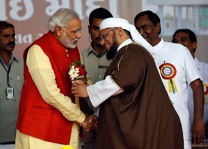 Narendra Modi receives flowers from a Muslim cleric.