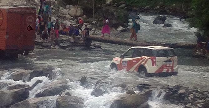 This stretch of river crossing was quite tricky, it even had a truck stuck mid-river.