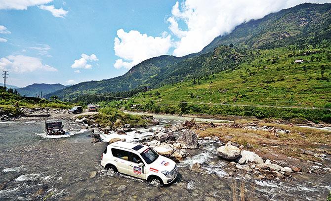 A landslide meant going off road through a flowing river.