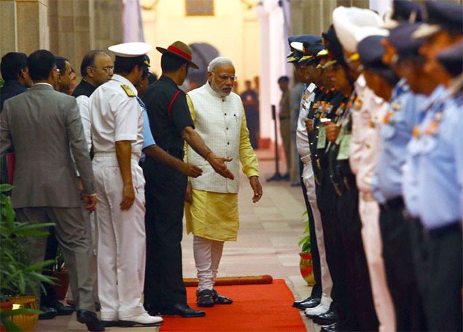 Prime Minister Narendra Modi arrives at the Combined Commanders Conference in New Delhi, October 17, 2014.