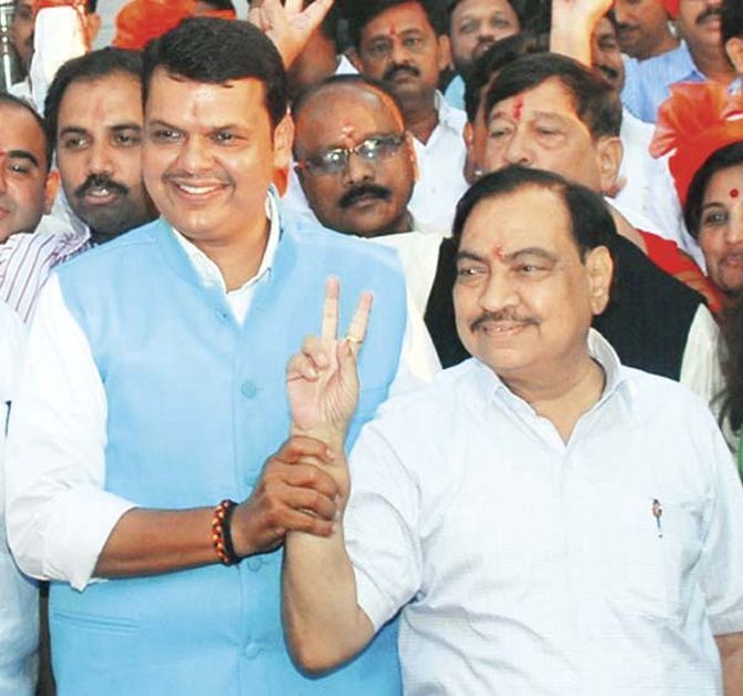 Maharashtra Chief Minister Devendra Fadnavis, left, with Revenue Minister Eknath Khadse.