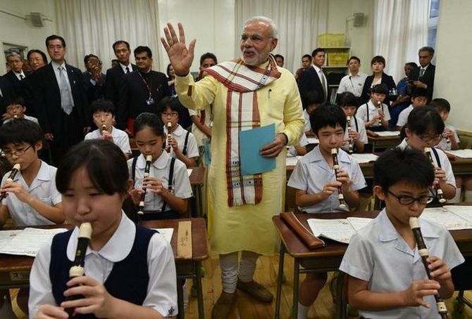 Prime Minister Narendra Modi interacts with students at the Taimei Elementary School, in Tokyo. Photograph: The Prime Minister's Office.