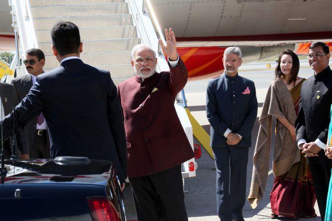 Prime Minister Narendra Modi arrives in New York. Also in the photograph: India's Ambassador to the US Dr S Jaishankar, his wife Kyoko Jaishankar and Ambassador Dyaneshwar Mulay, India's consul general in New York. Photograph: Mohammad Jaffer/Snaps India